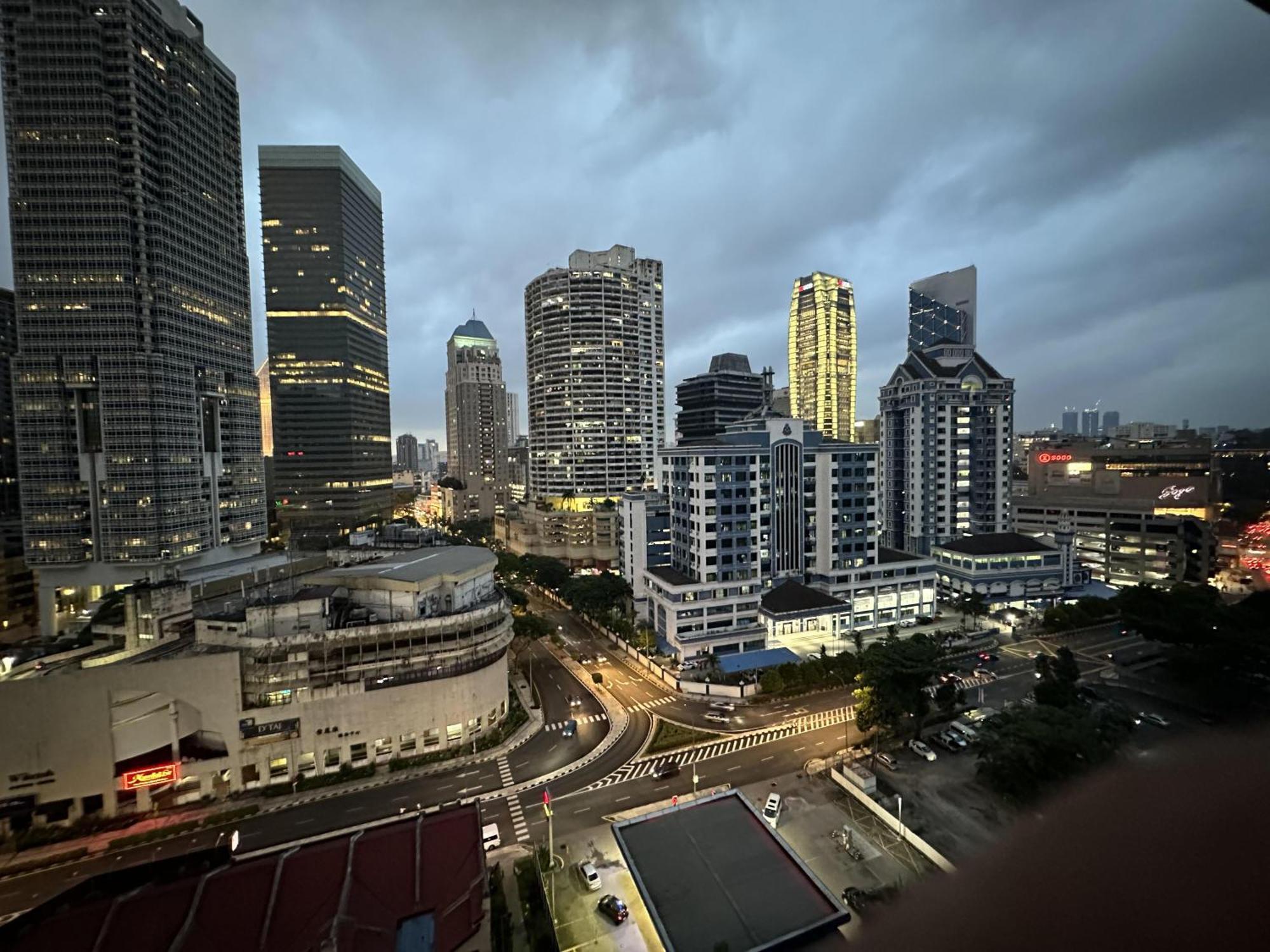 Klcc With A Rooftop Garden Playground
